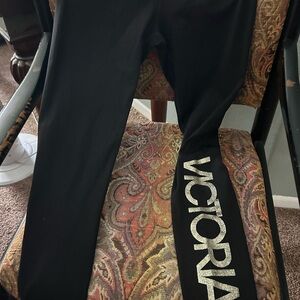 Victoria's Secret Black Leggings with gold glitter logo